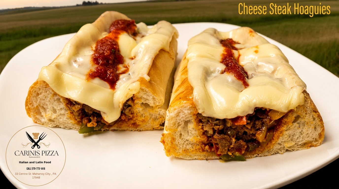 Two Carinis Pizza cheese steak hoagies with melted cheese and red sauce on a white plate outdoors.