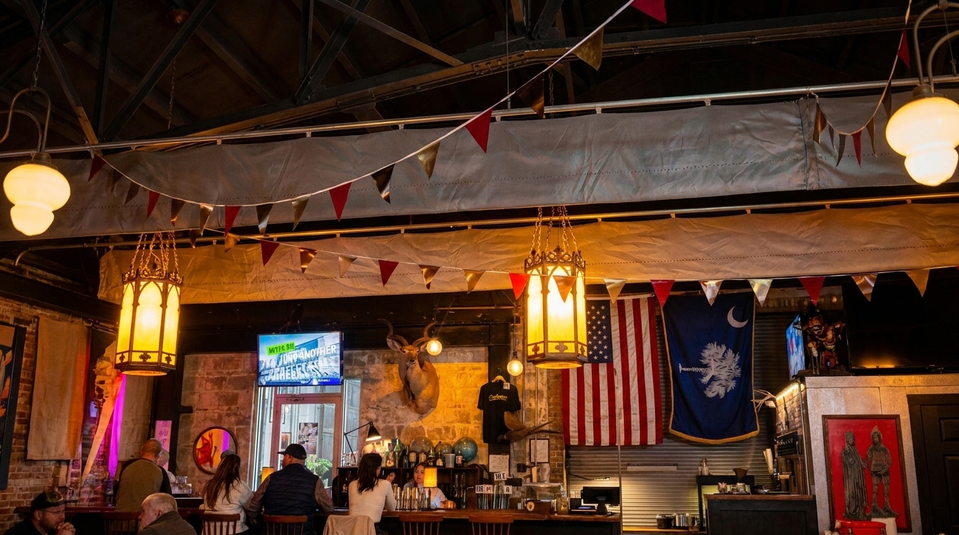 A dimly lit bar interior with patrons, decorative flags, and American and South Carolina flags on the wall.