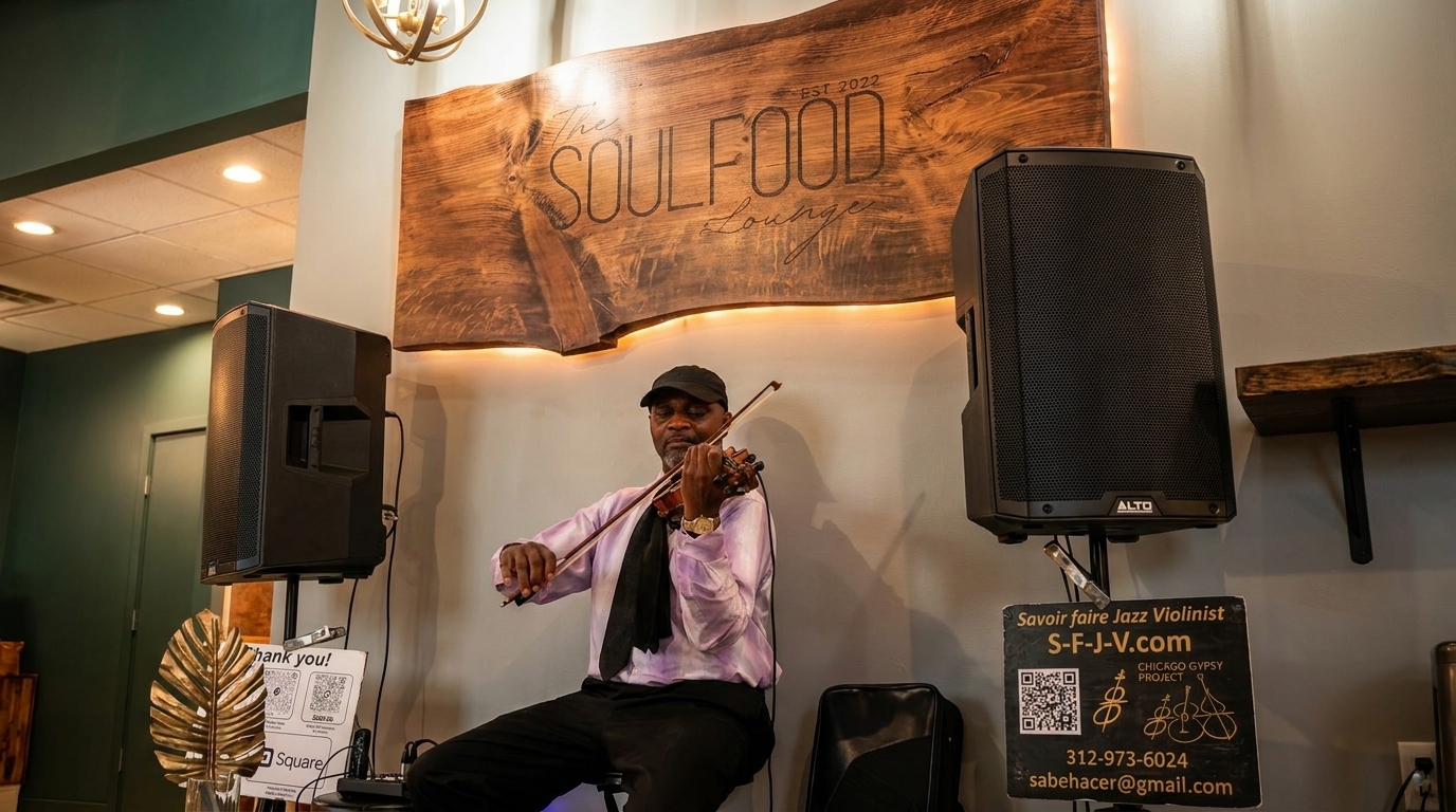 A jazz violinist performs under "The Soulfood Lounge" sign, with speakers and a QR code for tips.