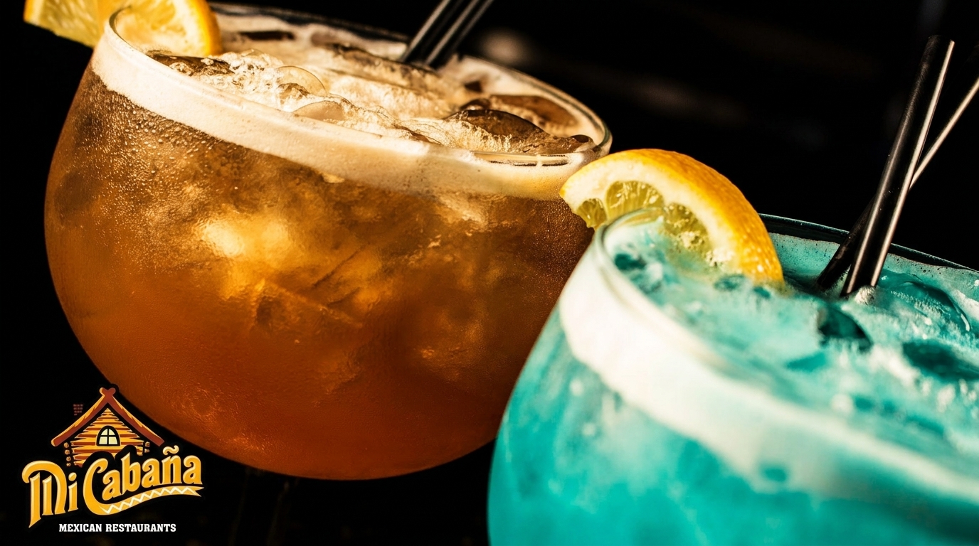 Two vibrant cocktails, one amber and one blue, garnished with lemon slices and straws.