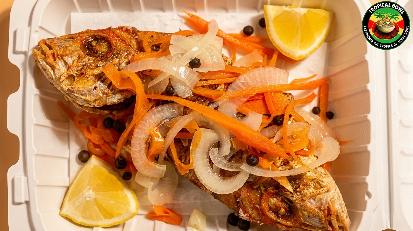 Fried fish topped with pickled carrots and onions, garnished with lemon wedges in a takeout container.